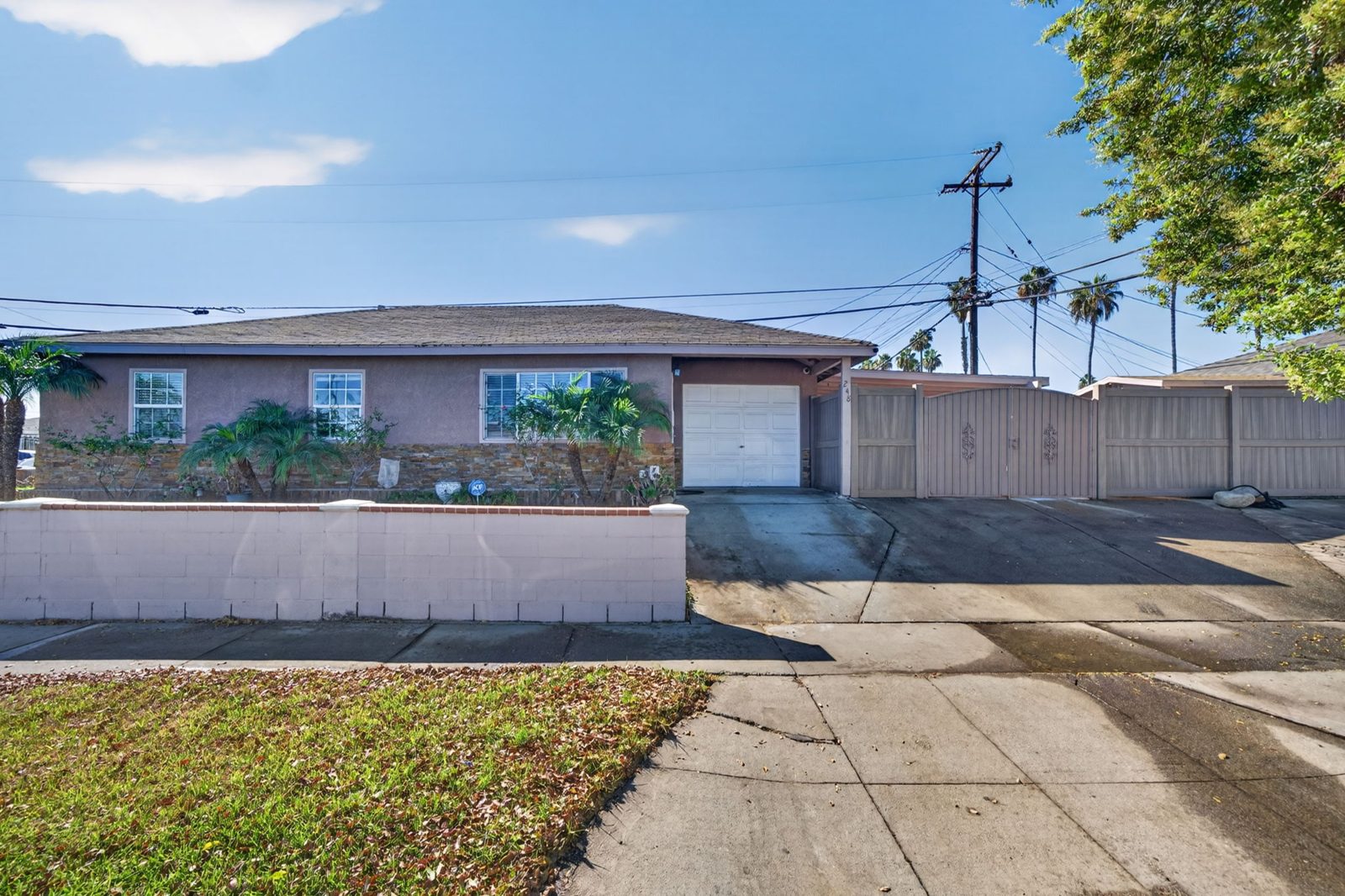Front exterior of 248 E 186th Street, a single-story corner-lot home in Carson