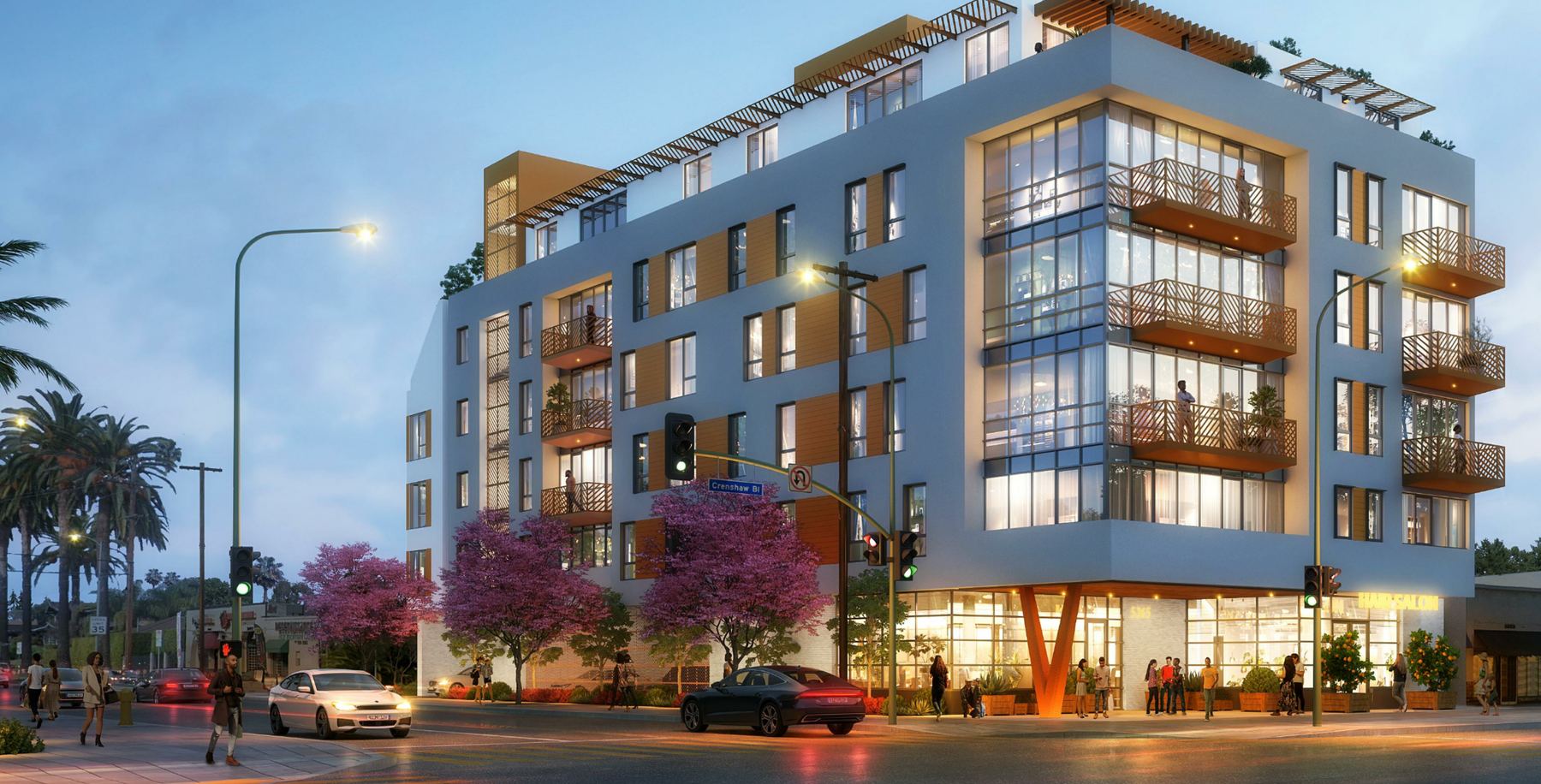 Rendering of The Clark on 54th at dusk: a six-story building on the corner of Crenshaw Boulevard and 54th Street, ground-floor storefronts lit, jacaranda trees along the sidewalk.